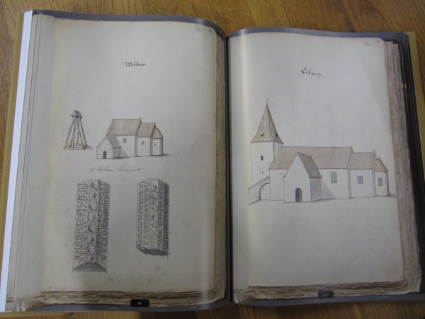 Uppslag som visar teckningar av Valtorps kyrka och Falköpings kyrka